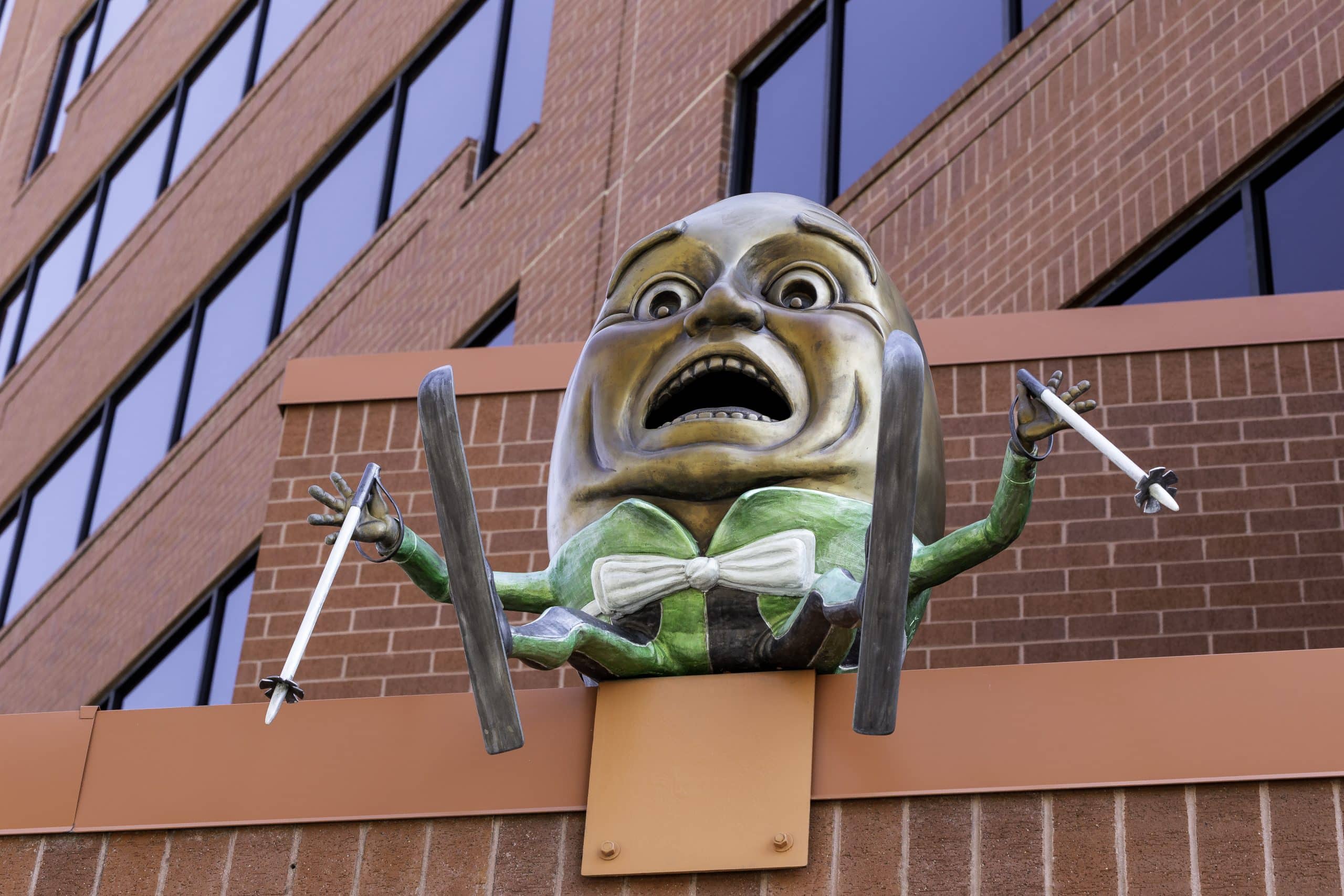 Eggie the Eagle presenting Located at Plaza of the Rockies North Tower