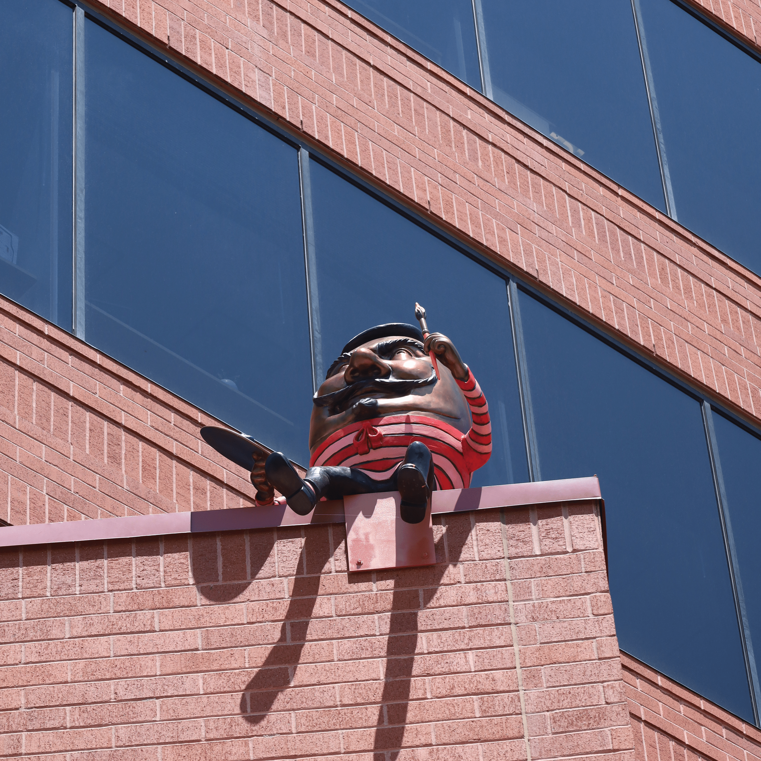 Eggspressionist presenting Located at Plaza of the Rockies South Tower