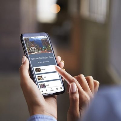 Close up of womans hands using smartphone touchscreen